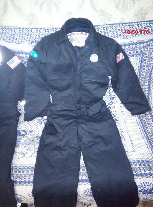 Зимние комбинезоны