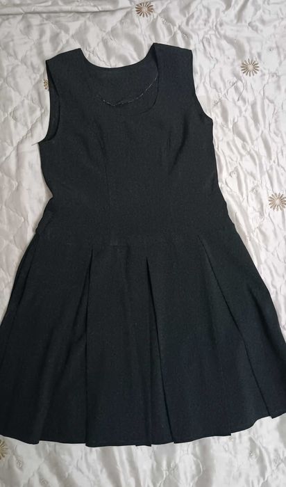 Продам сарафан школьный на девочку