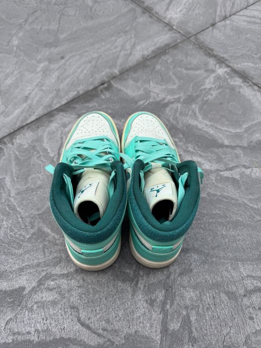 Air Jordan 1 Mid SE "Bleached Turquoise" sneakers.