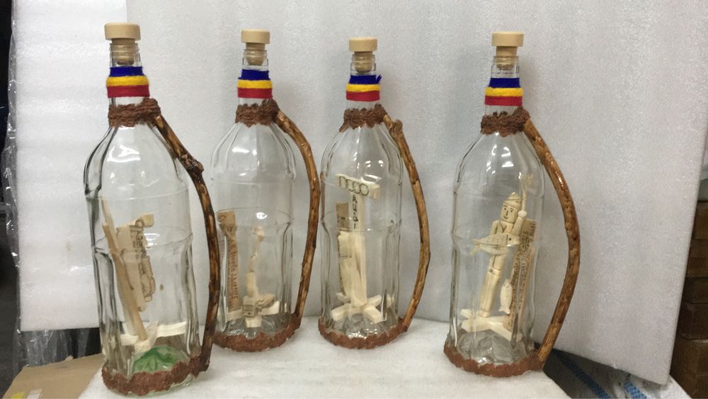Sticle cu sculptura din lemn