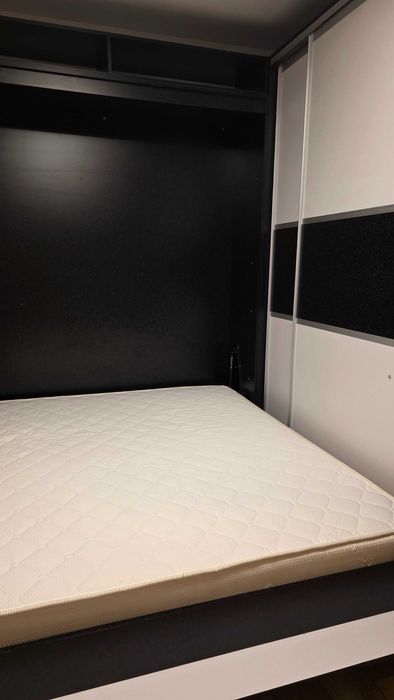 Легло с падащ механизъм