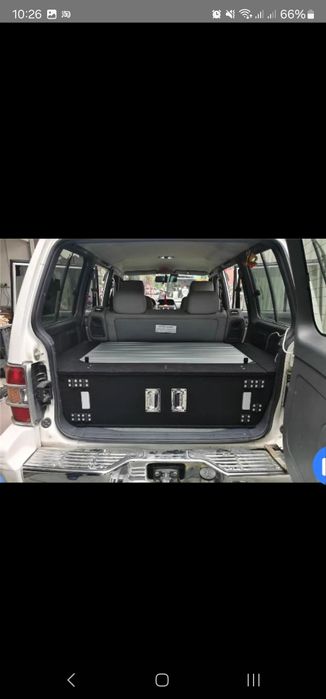 Органайзер в Митсубиси паджеро 2