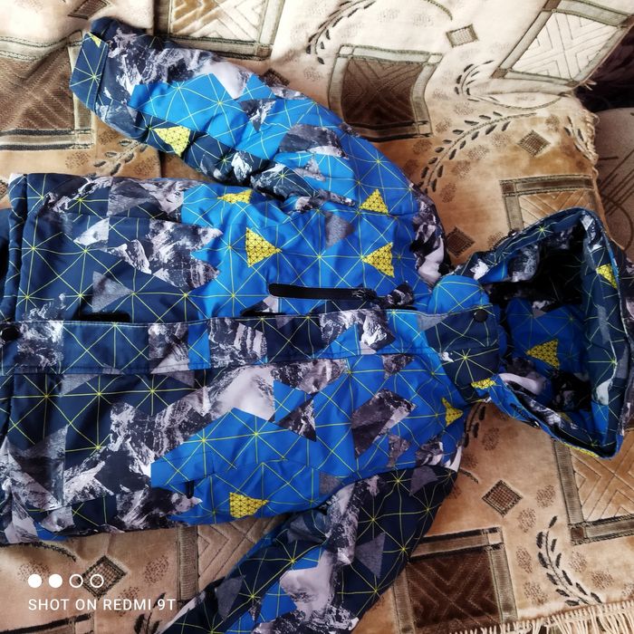 Продам комбинезоны 122 см