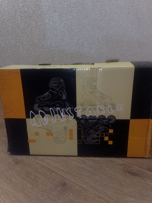 Роликовые коньки