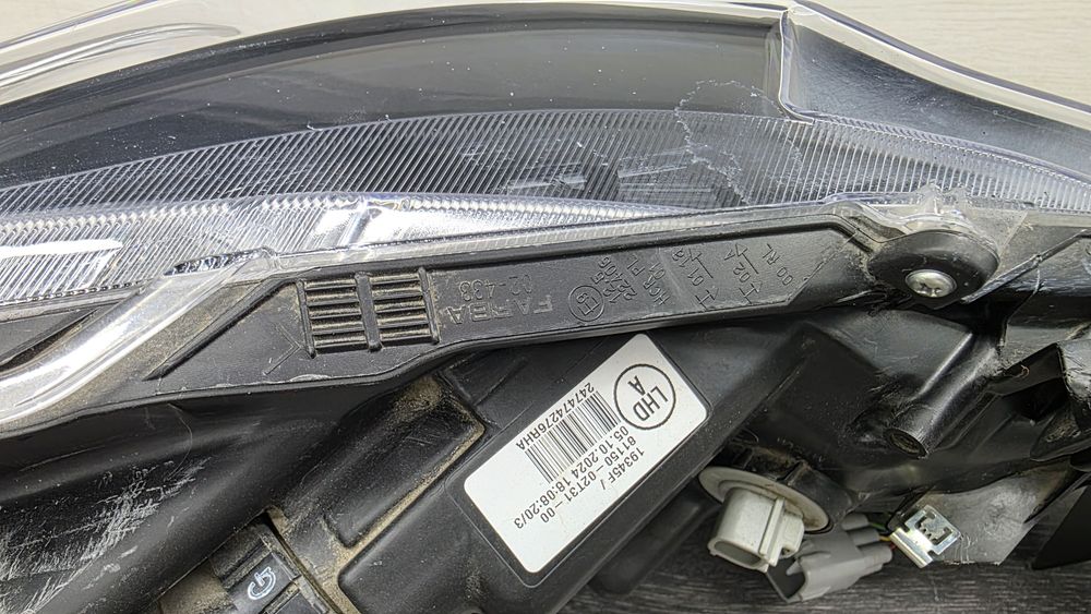 Фара Toyota Corolla e210