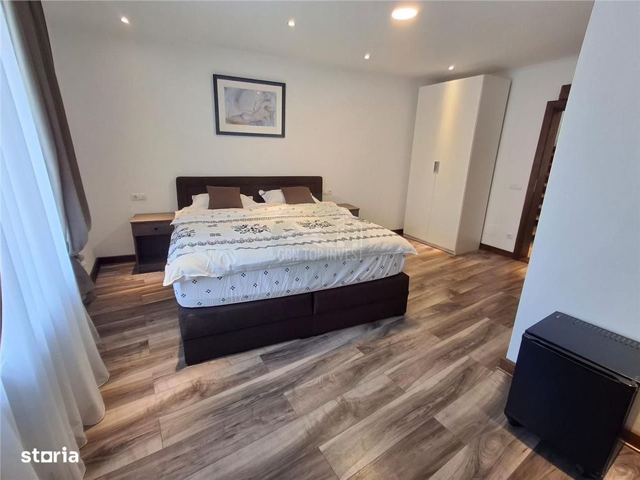 Casa individuala 4 camere 4 bai 250mp curte zona Piata Cluj