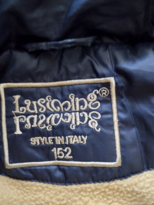 Куртки на девочку