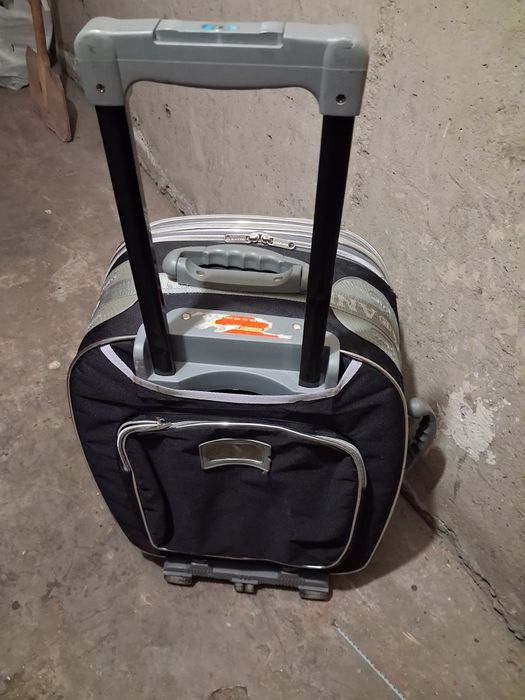 Пътнически куфар с колелца