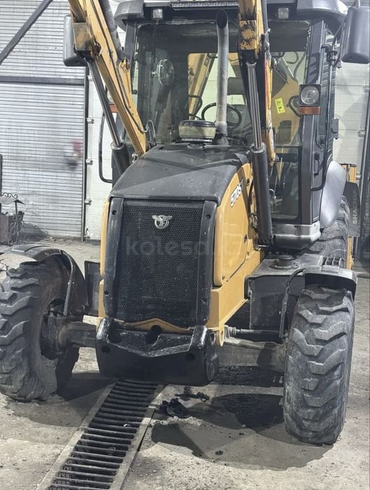 Эксоватор погрузчик Case 570zt
