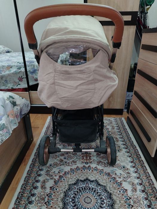 Қиш–Ёз болалар араваси. Қўшимча қишки чехол билан.  Зима лето коляска