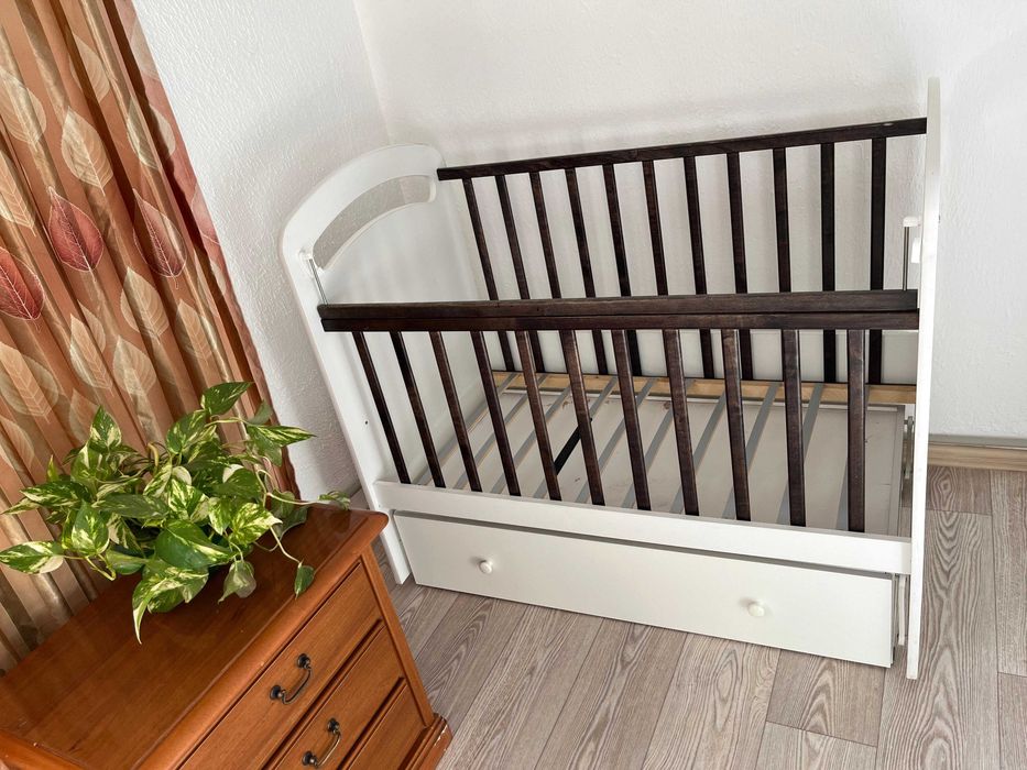 детская кроватка манеж с маятниковым механизмом