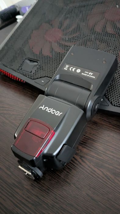 Фотовспышка andoer AD560 IV