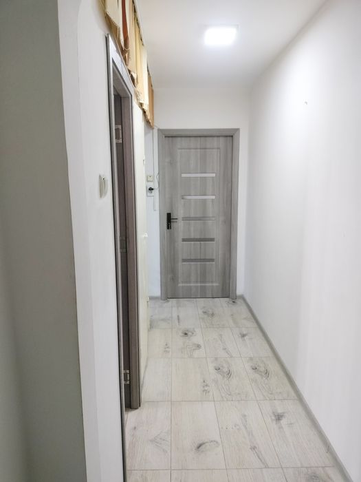 Apartament 2 cam , semidecomandat,,zona vest-podul înalt,etj 2 multiple îmbunătățiri.