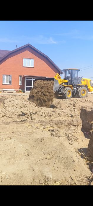 Услуги фронтального погрузчика.
