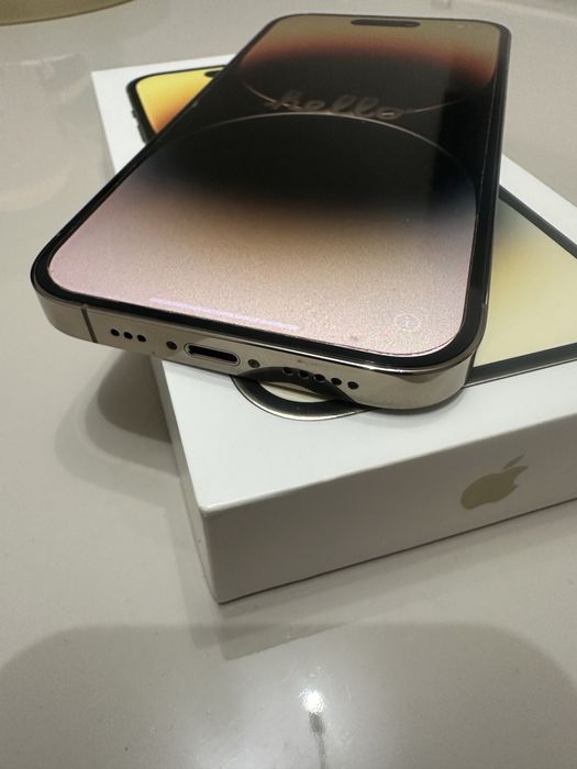 iPhone 14 Pro 128 GB gold-arata ca nou, fara defecte