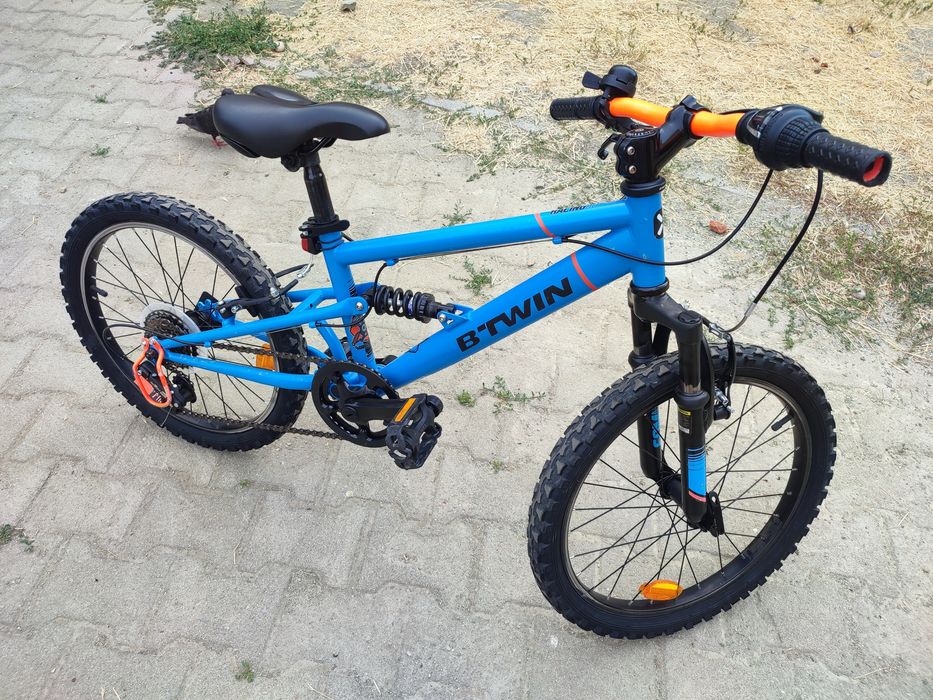 Bicicleta aproape noua