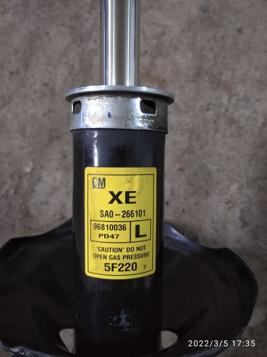 Передний амортизатор Gentra, Lacetti.