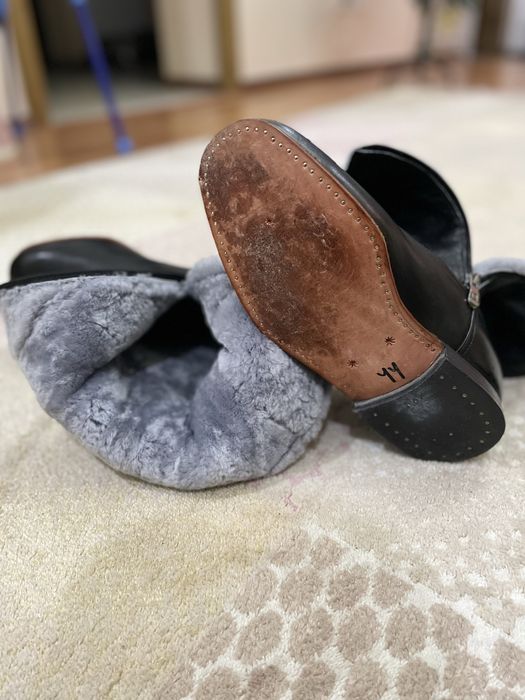 Продам кожанные сапоги.