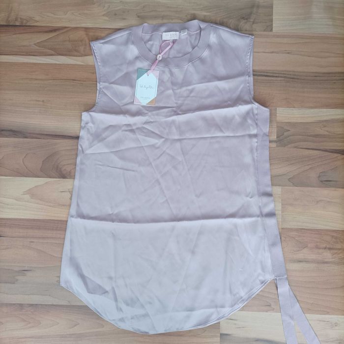 Ted Baker с пух и пера за преходен сезон