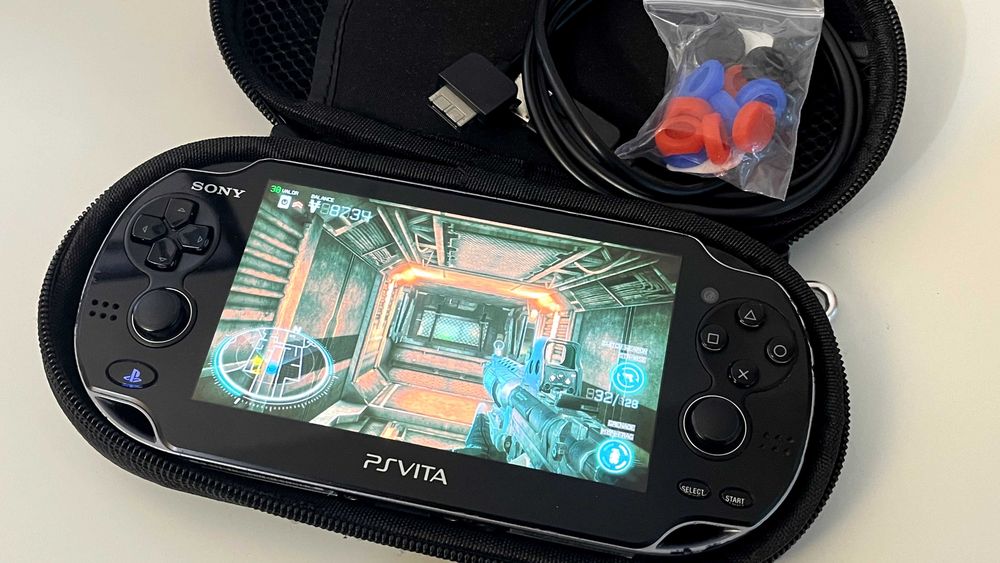 PS Vita OLED PCH-1104 modată - card 64GB, SD2Vita + husă