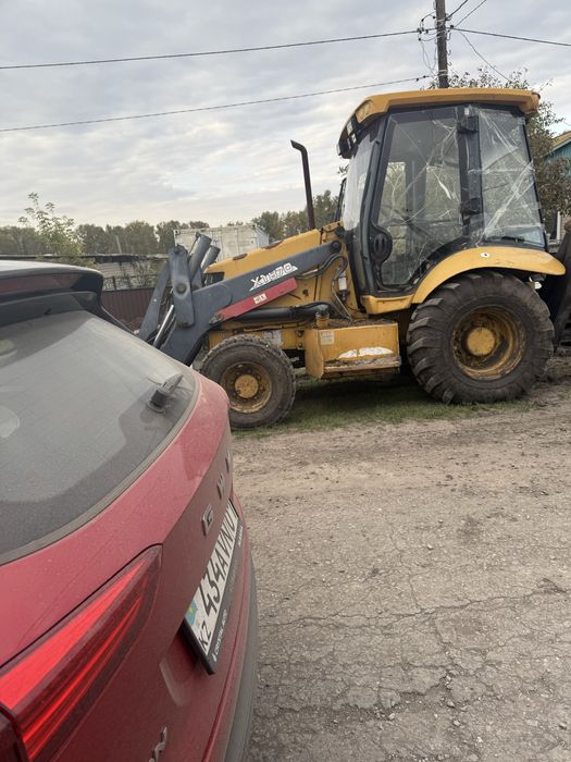 Погрузчик-эксковатор