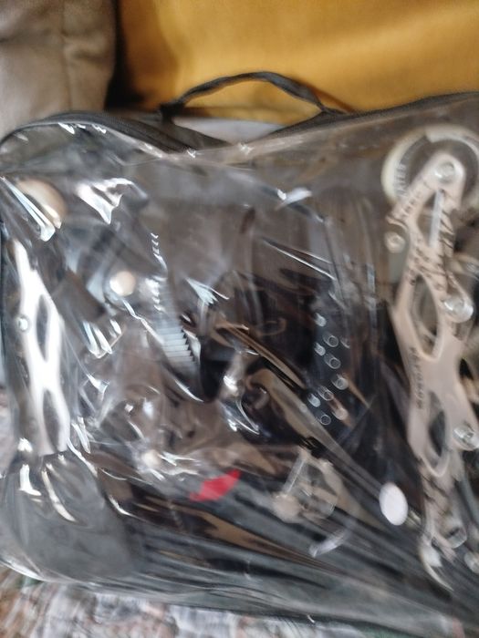 Ролликовые коньки черные