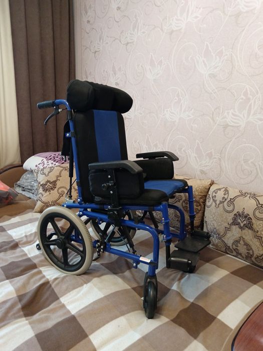 Детская инвалидная коляска