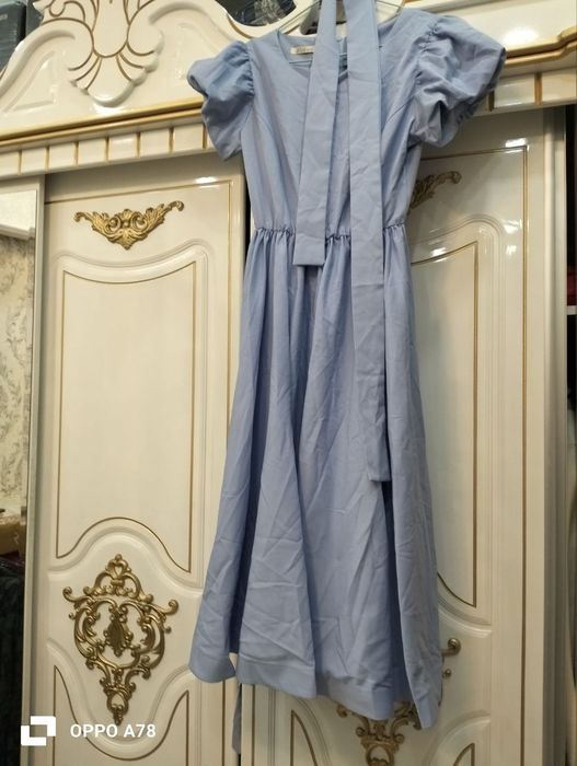 Кўйлак размер 48.