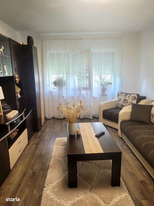 Apartament cu 3 camere, mobilat, gradină