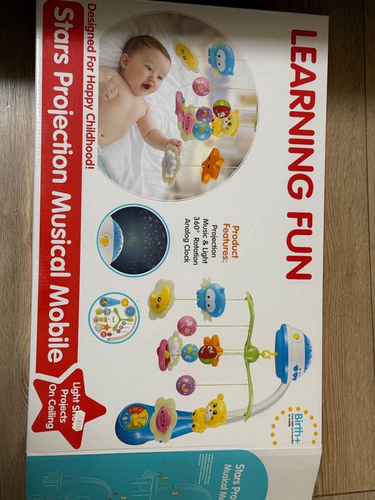 Въртележка над легло