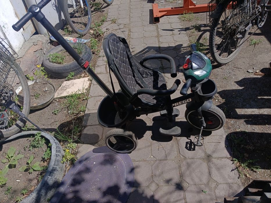 Продам детский велосипед с ручкой