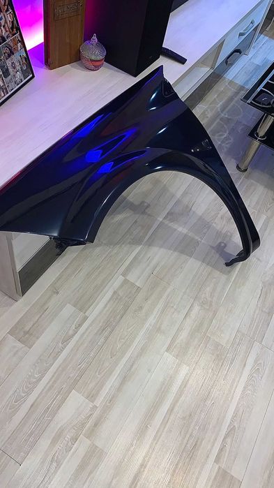 Aripa stanga fata Megane 2 vopsita proapat in cod de culoare.