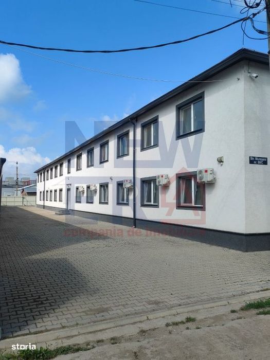 Cladire multifunctionala de vanzare – 24 locuinte, curte, randament