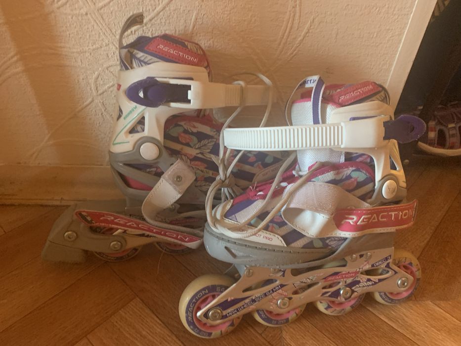 Роликовые коньки