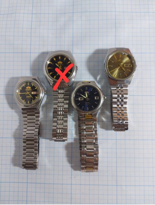 Часы Ориент оригинал автоподзавод родные браслеты цена за одни часы .