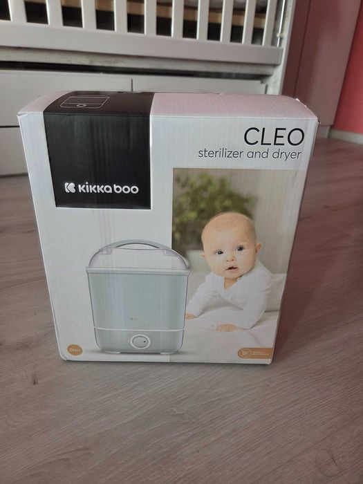 Стерилизатор за бебешки шишета с функция сушене.