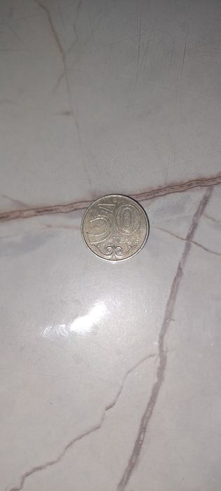 Тенге редкой модели