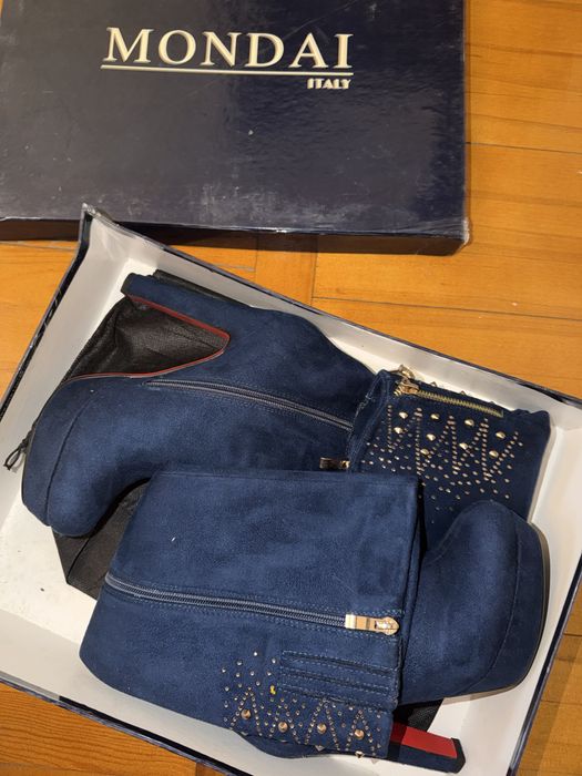 Зимние сапоги на каблуке