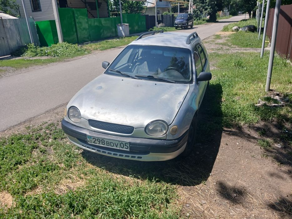 Тойота королла е110