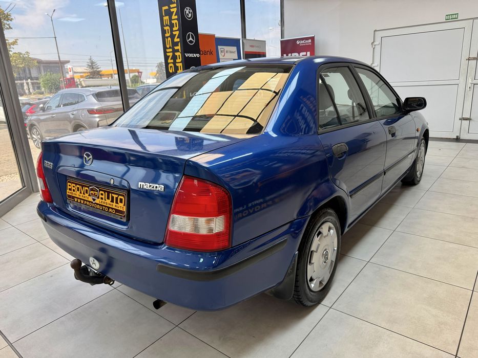 Mazda 323i Sedan 2001 | 1.3i | 90CP | Clima Ac | Radio | 203.000Km