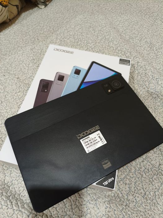 Планшет Doogee в хорошом состоянии.