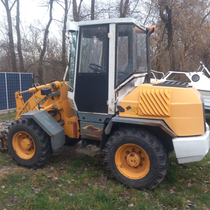 Volă..încărcător frontal..5T