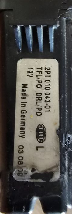 Day lightning Hella 2PT 010 043-01
TT
L
TFLIPO DRL/PO
12V