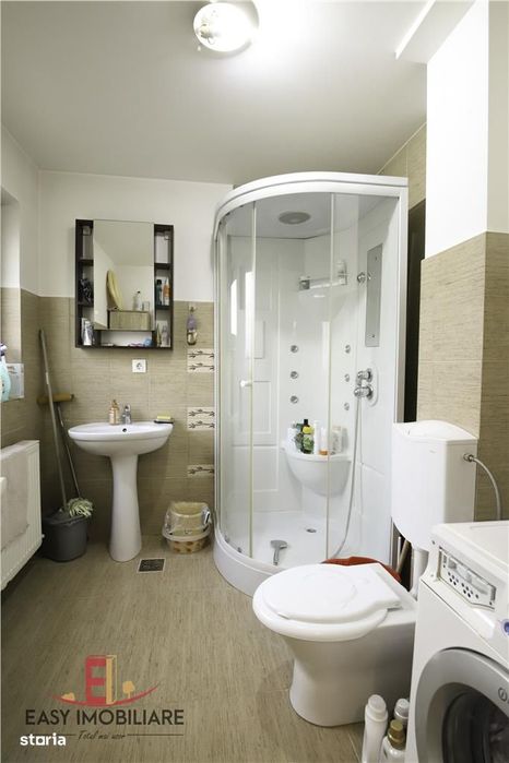 Casa individuala Unirii, 2 dormitoare, 2 bai, 80 mp, zona linistita.