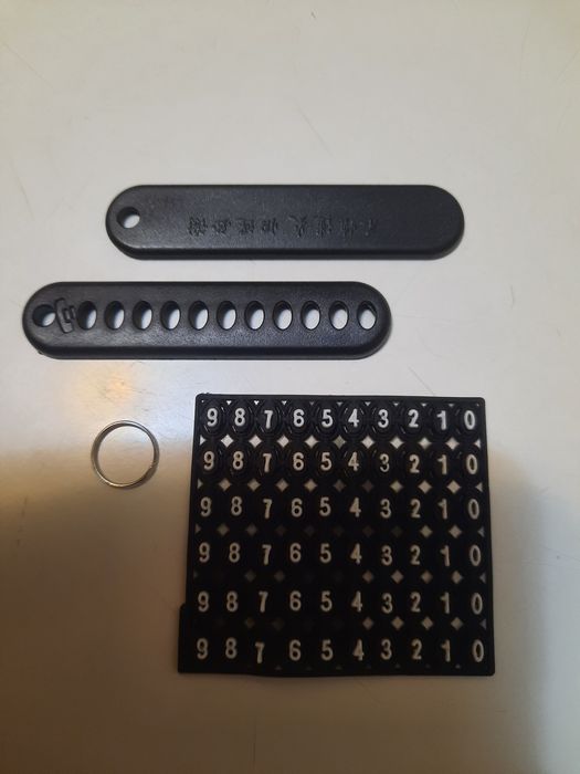 Наборный брелок с номером телефона