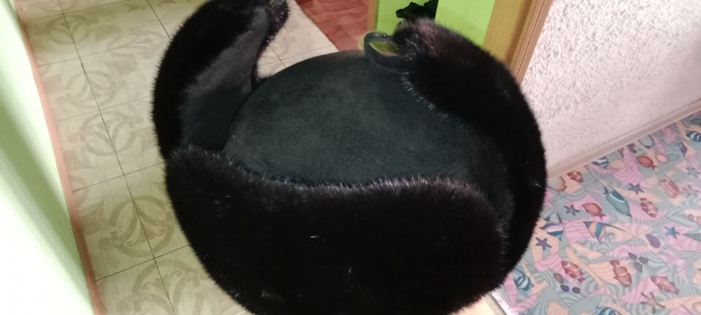 Продам зимнию шапку