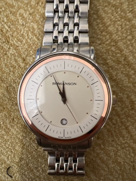 Продаю часы Romanson