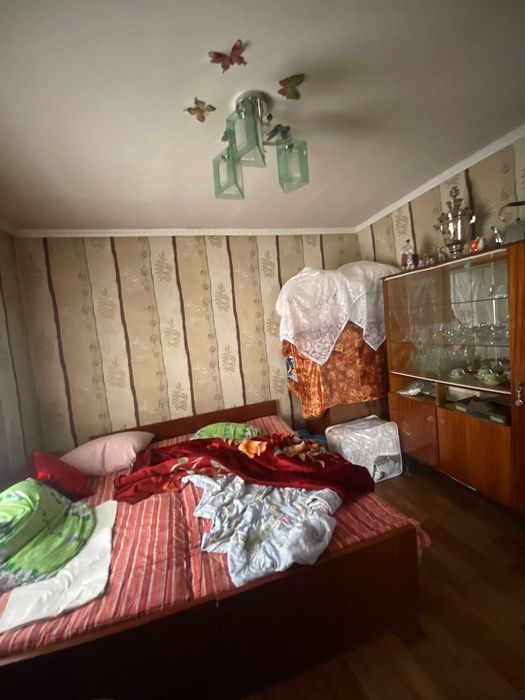 Дом, улица Калиева, Танат Империя