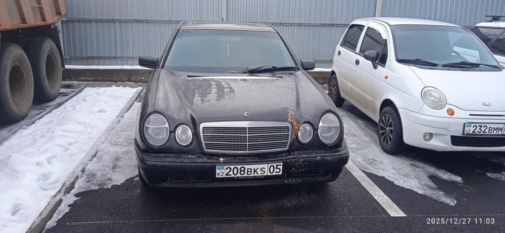 Мерседес 210 бенс