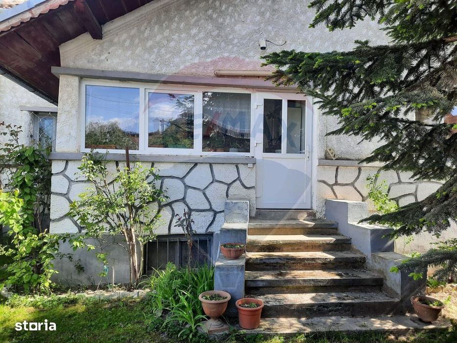 Casă langa Fagaras cu teren de 1836mp si parau in spatele curtii